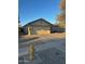 Single-story house with a two-car garage and desert landscaping at 2172 W Pinkley Ave, Coolidge, AZ 85128