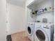 Bright laundry room featuring washer and dryer at 2172 W Pinkley Ave, Coolidge, AZ 85128