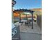 Patio with pergola, seating area, and fire pit at 2172 W Pinkley Ave, Coolidge, AZ 85128