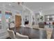 Bright dining room with views to entry and living areas at 2181 W Thompson Pl, Chandler, AZ 85286