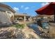 Enjoy this inviting kidney shaped pool with plenty of lounge space at 2181 W Thompson Pl, Chandler, AZ 85286