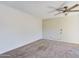 Generous sized bedroom with ceiling fan and carpeted floors at 2228 E Campbell E Ave # 234, Phoenix, AZ 85016