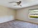 Well-lit bedroom with ceiling fan and carpet flooring at 2228 E Campbell E Ave # 234, Phoenix, AZ 85016