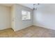 Simple dining area with tile floors and chandelier at 2228 E Campbell E Ave # 234, Phoenix, AZ 85016