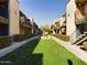 Community features lush landscaping and courtyard fountain at 2228 E Campbell E Ave # 234, Phoenix, AZ 85016