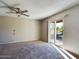 Spacious living room with sliding door to patio access at 2228 E Campbell E Ave # 234, Phoenix, AZ 85016