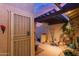 Charming courtyard with a gate and various potted plants at 2256 W Lindner Ave # 25, Mesa, AZ 85202