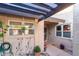 Covered entryway with pergola, landscaping, and access door at 2256 W Lindner Ave # 25, Mesa, AZ 85202