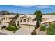 Two-story house with a three-car garage and landscaped yard at 23046 N 21St St, Phoenix, AZ 85024