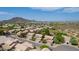 Aerial view of neighborhood with mountain backdrop at 23046 N 21St St, Phoenix, AZ 85024