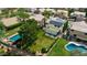 Aerial view of house with pool, solar panels and covered patio at 23046 N 21St St, Phoenix, AZ 85024