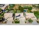 Aerial view of two houses with pools and solar panels at 23046 N 21St St, Phoenix, AZ 85024