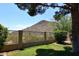 Landscaped backyard with mountain views and a block wall fence at 23046 N 21St St, Phoenix, AZ 85024