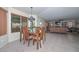 Dining area with a view to the exterior, seamlessly connected to living room at 23046 N 21St St, Phoenix, AZ 85024