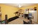 Bright home gym with treadmill, exercise bike, and weights at 23046 N 21St St, Phoenix, AZ 85024