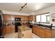 Modern kitchen with granite countertops and stainless steel appliances at 23046 N 21St St, Phoenix, AZ 85024