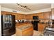 Modern kitchen with granite countertops and stainless steel appliances at 23046 N 21St St, Phoenix, AZ 85024