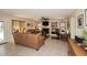 Spacious living room featuring a fireplace and built-in shelving at 23046 N 21St St, Phoenix, AZ 85024