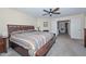 Main bedroom featuring a ceiling fan, bench and furnishings, perfect for relaxing at 23046 N 21St St, Phoenix, AZ 85024