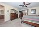 Main bedroom featuring ceiling fan, furnishings, and natural light at 23046 N 21St St, Phoenix, AZ 85024