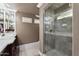 Large bathroom with walk-in shower and and sinks at 2336 Leisure World --, Mesa, AZ 85206