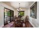 Breakfast nook with hardwood floors and sliding glass doors at 2336 Leisure World --, Mesa, AZ 85206