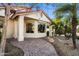 Inviting front entrance with a brick pathway leading to the home's entryway at 2336 Leisure World --, Mesa, AZ 85206