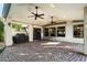 Covered patio with brick pavers, ceiling fans, and built-in grill at 2336 Leisure World --, Mesa, AZ 85206