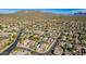 Aerial view of neighborhood with desert landscape and mountain backdrop at 2355 N Cabot --, Mesa, AZ 85207