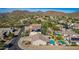 Aerial view of houses with solar panels and pools, in a desert mountain setting at 2355 N Cabot --, Mesa, AZ 85207