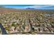 Aerial view of a large neighborhood, showcasing numerous homes and mountain views at 2355 N Cabot --, Mesa, AZ 85207