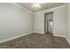 Spacious bedroom with carpeted floor and neutral wall colors at 2355 N Cabot --, Mesa, AZ 85207