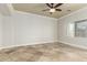 Spacious bedroom with tile floors and ceiling fan at 2355 N Cabot --, Mesa, AZ 85207