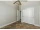 Bright bedroom with tile floors and double door closet at 2355 N Cabot --, Mesa, AZ 85207