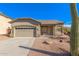 One-story home with attached garage and gravel driveway at 2355 N Cabot --, Mesa, AZ 85207