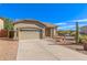 Single-story house with a two-car garage and desert landscaping at 2355 N Cabot --, Mesa, AZ 85207