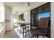 Private balcony with outdoor furniture and community views at 2511 W Queen Creek Rd # 415, Chandler, AZ 85248