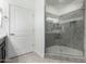 Bright bathroom featuring a walk-in shower and contemporary design at 2511 W Queen Creek Rd # 415, Chandler, AZ 85248