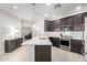 Modern kitchen with stainless steel appliances and white quartz countertops at 2511 W Queen Creek Rd # 415, Chandler, AZ 85248