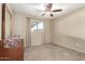 Simple bedroom with carpeted floor and ceiling fan at 2526 N 22Nd Dr, Phoenix, AZ 85009