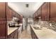 Modern kitchen with stainless steel appliances and granite counters at 2526 N 22Nd Dr, Phoenix, AZ 85009