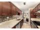 Updated kitchen with granite countertops and modern cabinetry at 2526 N 22Nd Dr, Phoenix, AZ 85009