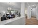 Open concept dining area with hardwood floors and chandelier at 26646 N 46Th Pl, Cave Creek, AZ 85331