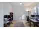 Bright home office features wood flooring, built-in shelving, and ample space for two work stations at 26646 N 46Th Pl, Cave Creek, AZ 85331