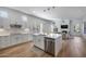 Modern kitchen with white cabinets, stainless steel appliances, and a large island at 26646 N 46Th Pl, Cave Creek, AZ 85331