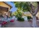 Relaxing pool area with patio furniture and lush landscaping at 26646 N 46Th Pl, Cave Creek, AZ 85331