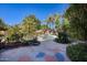 Landscaped backyard with a sparkling pool and patio at 26646 N 46Th Pl, Cave Creek, AZ 85331