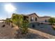 Landscaped backyard with gravel and desert plants at 27606 W Tonopah Dr, Buckeye, AZ 85396