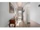 Bright entryway with wood floors and console table at 27606 W Tonopah Dr, Buckeye, AZ 85396