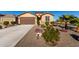 House exterior with desert landscaping and driveway at 27606 W Tonopah Dr, Buckeye, AZ 85396